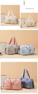Detailed view of large travel bags in multiple colors with functional front pockets