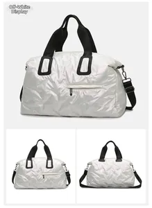 Detailed views of high-gloss off-white quilted travel bag with black shoulder strap