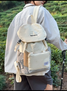 Detail view of the large-capacity outdoor backpack with color-blocking and wrinkled fabric