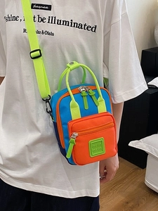 Multicolor waterproof nylon crossbody mini bag with adjustable straps and front zip pocket