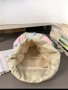 Internal view of the large capacity nylon backpack with zipper pocket and color blocking