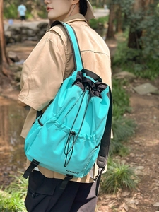 Waterproof nylon backpack in tiffany blue with drawstring closure for sports and travel