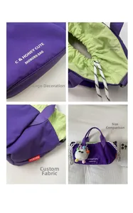 Detail of purple nylon bag featuring drawstring closure, green lining and soft pom pom charm