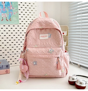 Pink quilted backpack with star patches, cute heart pendant and spacious pockets