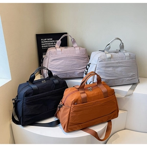 Détails des sacs de voyage en nylon de plusieurs couleurs avec bandoulières renforcées