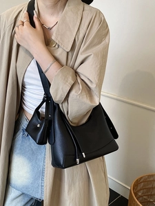 Chic black litchi pattern shoulder bag with mini pouch and elegant leather drawstrings