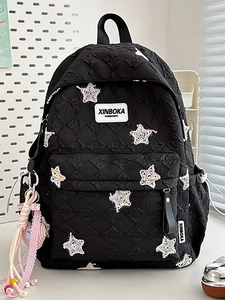 Quilted black star backpack for girls with cute sequins and stylish heart charm accessory