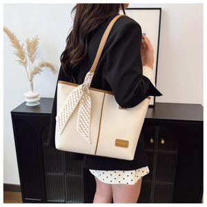 Chic off-white tote bag with lychee leather texture and checkered silk scarf detail