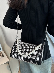 Elegant black Boston bag with sparkling rhinestones and a white pearl chain strap