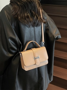 Chic apricot square handbag with H-shaped metal buckle and adjustable shoulder strap