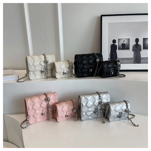 Detailed comparison of white, black, pink, and silver quilted bags in two different sizes