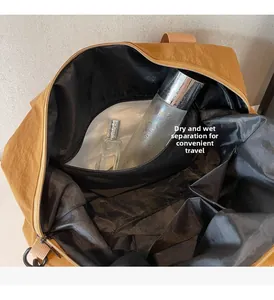 Detail view of large travel bag with internal wet-dry separation zipper pocket