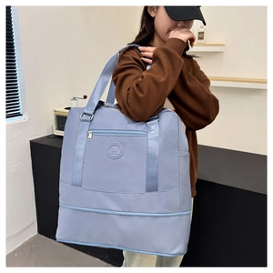 Light blue oxford fabric yoga sports bag with WindBlows logo and front zipper pocket