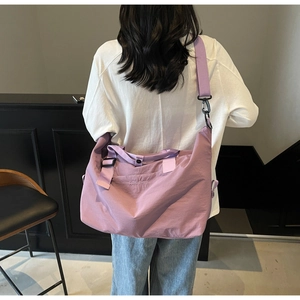 Purple large capacity travel duffel bag with adjustable shoulder strap and embroidery