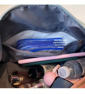 Detail view of dry-wet separation pocket and interior organization for fitness bag