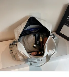 Top view of spacious travel bag interior showing large capacity for clothes and toiletries