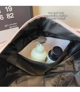 Detail view of the dry-wet separation layer and waterproof zipper in canvas travel bag