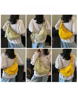 Collage of model wearing green and yellow canvas dumpling bags with zipper detail
