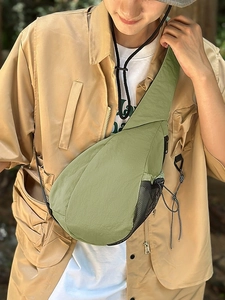 Outdoor grass green nylon sling bag for women with side mesh pocket and teardrop design