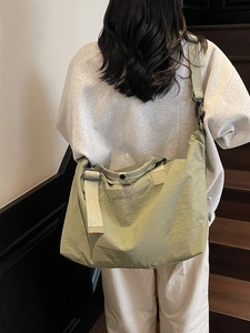 Large capacity mint green travel bag for gym and sports with adjustable shoulder strap