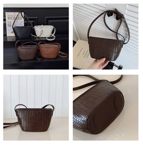 Detail showing woven texture and bottom protective pads of the bucket shoulder bag
