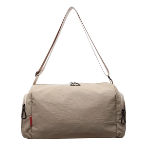 Large capacity nylon travel bag in beige for gym and sports with adjustable shoulder strap