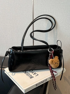 Glossy black PU leather shoulder bag with letter embossing and plush bear charm