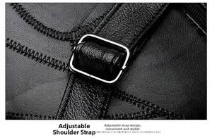 Detail of adjustable metal buckle and stitching on black lychee grain leather strap