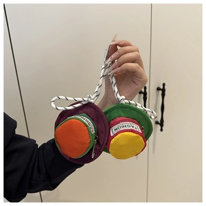 Close-up of portable hat-shaped mini pouches in purple and green with a metal hook