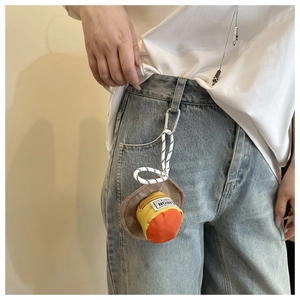 Mini hat-shaped pouch in orange and yellow with carabiner clip on jeans belt loop