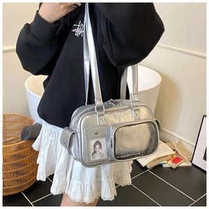 Close-up of metallic silver bowling bag with a transparent PVC front pocket and card slot