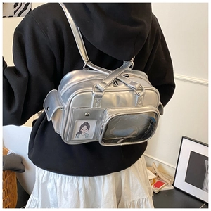 Macro detail of silver metallic bowling bag featuring transparent PVC window and card slot