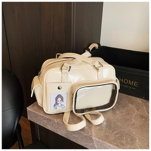 Macro detail of cream white PU leather bag with transparent window for pins and badges