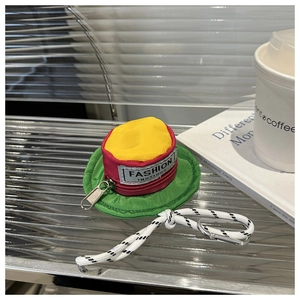 Detail of creative hat-shaped pouch with tricolor stitching and metal carabiner