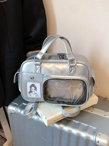 Metallic silver ita bag with transparent display window and double handles in a sleek design