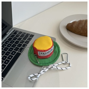 Detail of creative hat-shaped pouch with tri-color nylon and metal climbing hook