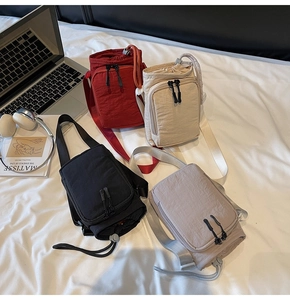 Detail of colorful waterproof nylon mini crossbody bags with adjustable straps for commuting