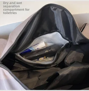 Detail view of dry-wet separation compartment with waterproof zip for travel bag