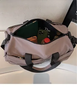 Top view of spacious travel bag interior showing storage for tablet, phone, and wallet