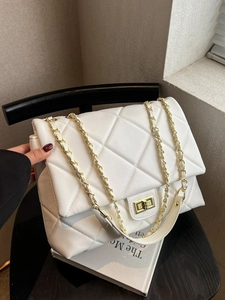 White large quilted faux leather shoulder bag with gold chain and turn-lock closure