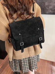 Vintage black faux suede backpack with double buckle straps for women in school style