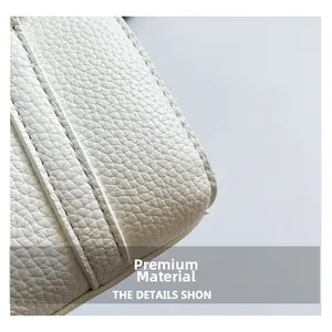 Close-up of white lychee grain leather with premium double stitching on the pillow bag