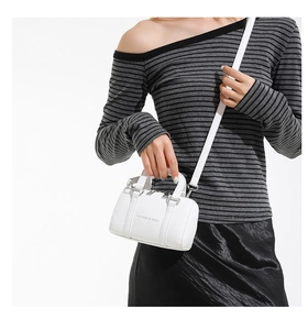 Detail of white litchi pattern mini Boston bag with Fashion & Bags lettering and strap