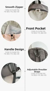 Detail view of pink and grey nylon backpack showing dual zippers and drawstring pocket