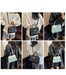 Detail showing vintage square bags in black and green with textured faux leather
