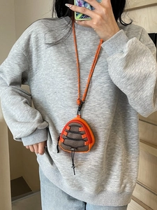 Mini triangle neck pouch in orange and brown with breathable mesh for outdoor use