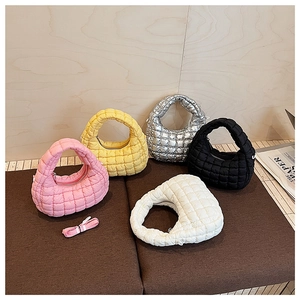 Five quilted puffer cloud bags in diverse colors with detachable shoulder straps