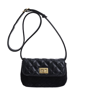 Chic black quilted crossbody bag with gold twist lock and mixed leather textures