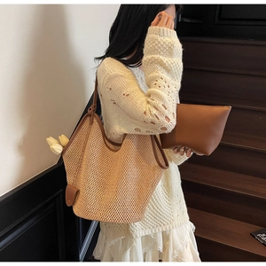 French style woven straw tote bag with brown leather trim and matching leather pouch set