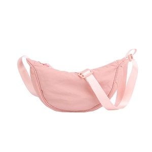 Pink minimalist nylon half-moon crossbody bag with adjustable wide strap and arc design